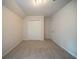 Bedroom featuring neutral carpet, paint, and closet at 2899 Duncan Pl, Decatur, GA 30034