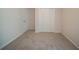 Bedroom featuring neutral carpet, paint, and closet at 2899 Duncan Pl, Decatur, GA 30034