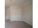 This bedroom features a closet and neutral carpet at 2899 Duncan Pl, Decatur, GA 30034