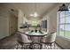 Bright dining room with modern table and seating at 2899 Duncan Pl, Decatur, GA 30034
