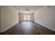 Spacious living room with hardwood floors, ceiling fan, and natural light at 2899 Duncan Pl, Decatur, GA 30034