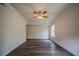 Bright living room with modern hardwood floors, ceiling fan, and natural light at 2899 Duncan Pl, Decatur, GA 30034