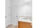 Bathroom featuring a neutral vanity with a white countertop and white fixtures at 5480 Beaver Ridge Drive Dr, Cumming, GA 30040