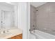 Bathroom featuring a shower-tub combination and vanity with large mirror at 5480 Beaver Ridge Drive Dr, Cumming, GA 30040
