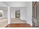 Inviting foyer with hardwood floors, elegant columns, and a view into the spacious living areas at 5480 Beaver Ridge Drive Dr, Cumming, GA 30040
