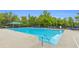 Expansive outdoor swimming pool surrounded by seating, ideal for relaxation and recreation at 5480 Beaver Ridge Drive Dr, Cumming, GA 30040
