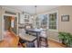 Cozy breakfast nook featuring natural light, modern lighting, and a built in beverage center at 5628 Fallsbrook Nw Knl, Acworth, GA 30101