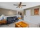 Cozy and inviting living room with comfortable seating, ample lighting, and stylish decor, perfect for relaxation at 5628 Fallsbrook Nw Knl, Acworth, GA 30101