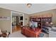 Inviting home office with custom built-ins and natural light filtering in from the adjacent room at 5628 Fallsbrook Nw Knl, Acworth, GA 30101