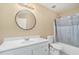 Bathroom featuring a shower and bathtub, a toilet, and a sink and vanity at 1027 Fellowship Rd, Fairburn, GA 30213