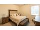 Cozy bedroom features a queen-sized bed and a window at 1800 Pearson St, Loganville, GA 30052