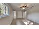 Relaxing bedroom with neutral carpeting and a ceiling fan at 4111 Sweet Water Ct, Conyers, GA 30094