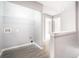 Laundry room with shelving and white trim at 74 Venture Path, Hiram, GA 30141