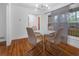 Cozy dining area with hardwood floors and modern lighting at 1386 Sandy Ln, Decatur, GA 30032