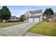 Charming two-story home with a two-car garage, stone accents and a well-manicured front yard at 2828 Marksman Trl, Austell, GA 30106