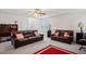 Spacious living room featuring plush sofas and neutral decor at 2828 Marksman Trl, Austell, GA 30106