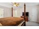 Large primary bedroom features neutral walls, a ceiling fan, and a view of the closet/bathroom area at 2828 Marksman Trl, Austell, GA 30106