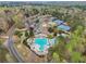 Community with a pool, clubhouse, parking, four tennis courts, and gorgeous surrounding trees at 3887 Hickory Manor Dr, Suwanee, GA 30024