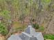 A unique view of the backyard and rooftop at 3887 Hickory Manor Dr, Suwanee, GA 30024
