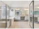 Bathroom features double vanity sinks, granite countertops, and mirrored cabinets at 3887 Hickory Manor Dr, Suwanee, GA 30024
