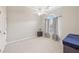 Inviting bedroom with a vaulted ceiling, soft carpet, and a window, creating a serene retreat at 3887 Hickory Manor Dr, Suwanee, GA 30024