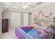 Cozy bedroom with neutral tones, double closets, and a comfortable bed, perfect for restful nights at 3887 Hickory Manor Dr, Suwanee, GA 30024