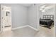 View from bedroom doorway shows neutral paint, and bath and bedroom doorways at 3887 Hickory Manor Dr, Suwanee, GA 30024