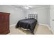 Bedroom features a neutral color paint, ceiling fan and tiled floors at 3887 Hickory Manor Dr, Suwanee, GA 30024