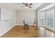 Bonus room features wood floors, ceiling fan, and lots of natural light at 3887 Hickory Manor Dr, Suwanee, GA 30024