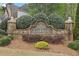Stone-clad 'Morning View at Clairidge' neighborhood sign surrounded by lush landscaping creating a welcoming entrance at 3887 Hickory Manor Dr, Suwanee, GA 30024