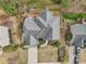 Beautiful view of the home's roofing, backyard and driveway at 3887 Hickory Manor Dr, Suwanee, GA 30024