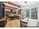 Well-equipped kitchen with island, stainless appliances, and eat in breakfast nook at 3887 Hickory Manor Dr, Suwanee, GA 30024