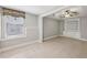 Bright room with a window seat, a coffered ceiling and a built in display cabinet with base storage at 3887 Hickory Manor Dr, Suwanee, GA 30024