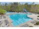 The community pool offers residents a place to relax in a Gathering-friendly environment with plenty of seating at 3887 Hickory Manor Dr, Suwanee, GA 30024