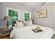 Bedroom filled with natural light highlighting a comfy bed and windows at 1382 Elizabeth Ln, Atlanta, GA 30344