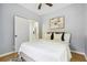 A serene bedroom featuring calming blue walls and a comfortable bed at 1382 Elizabeth Ln, Atlanta, GA 30344