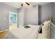 Stylish bedroom with hardwood floors, and a doorway to a dining room at 1382 Elizabeth Ln, Atlanta, GA 30344