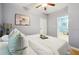 Bedroom featuring a calming color palette, modern décor, and hardwood floors at 1382 Elizabeth Ln, Atlanta, GA 30344