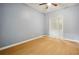 Neutral-toned bedroom with hardwood floors and ample closet space at 1382 Elizabeth Ln, Atlanta, GA 30344