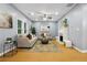 Comfortable living room featuring neutral tones, hardwood floors and a fireplace at 1382 Elizabeth Ln, Atlanta, GA 30344