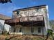 Back exterior showcasing a spacious deck and the home's layout at 1535 Wilkes Crest Dr, Dacula, GA 30019