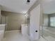 Clean bathroom with a shower, tub, and vanity for your convenience at 1535 Wilkes Crest Dr, Dacula, GA 30019