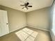 Comfortable bedroom featuring neutral colored walls and window at 1535 Wilkes Crest Dr, Dacula, GA 30019
