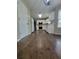 Open kitchen layout with white appliances, hardwood floors and lots of cabinet space at 1535 Wilkes Crest Dr, Dacula, GA 30019