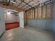 Unfinished basement with open doorway showcases potential for customization at 1535 Wilkes Crest Dr, Dacula, GA 30019