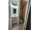 Updated bathroom features modern vanity, lighting, and a tiled shower with built-in shelves at 2089 Lenox Rd, Atlanta, GA 30324