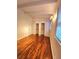 Bedroom featuring hardwood floors, overhead lighting and built-in closet space at 2089 Lenox Rd, Atlanta, GA 30324
