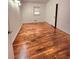 Bedroom with gleaming hardwood floors and a window providing natural light at 2089 Lenox Rd, Atlanta, GA 30324