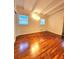 Bedroom featuring hardwood floors, overhead lighting and natural lighting at 2089 Lenox Rd, Atlanta, GA 30324