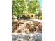 Street view of home featuring neutral color palette and manicured landscaping at 2089 Lenox Rd, Atlanta, GA 30324